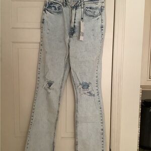 Women's Light Blue Distressed Jeans